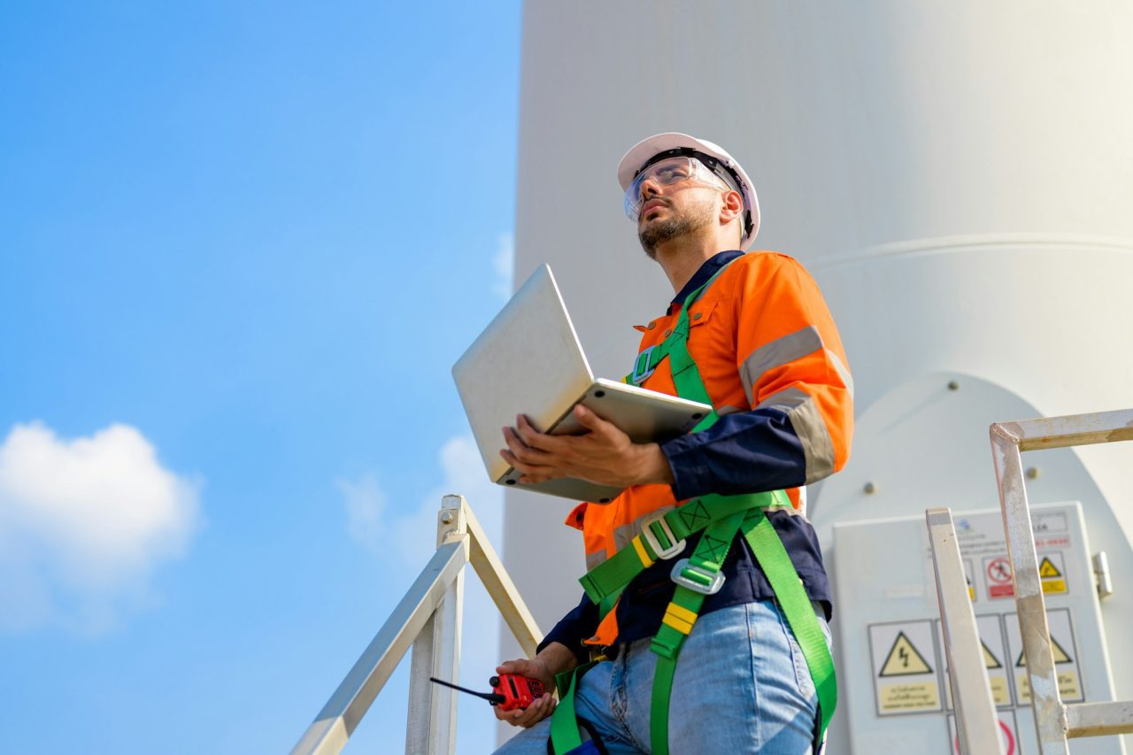 Renewable Energy Engineer Working On Wind Turbine 1.jpg